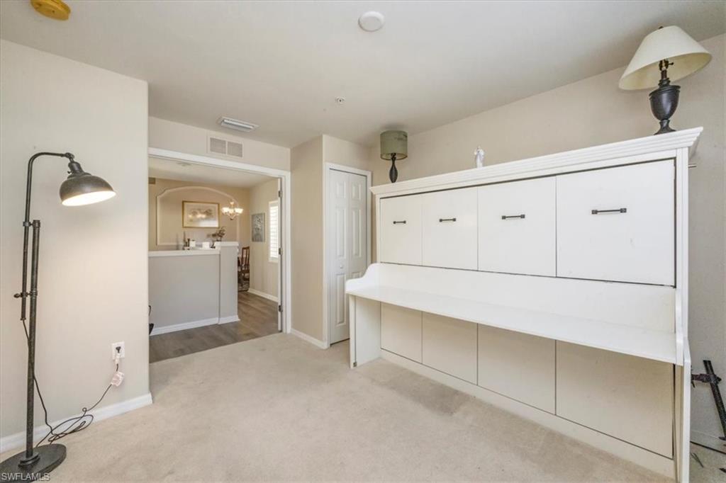 5705 Mayflower Way, Unit 1404 Ave Maria, FL 34142 - Photo 18 of 36 Murphy Bed with Office Function