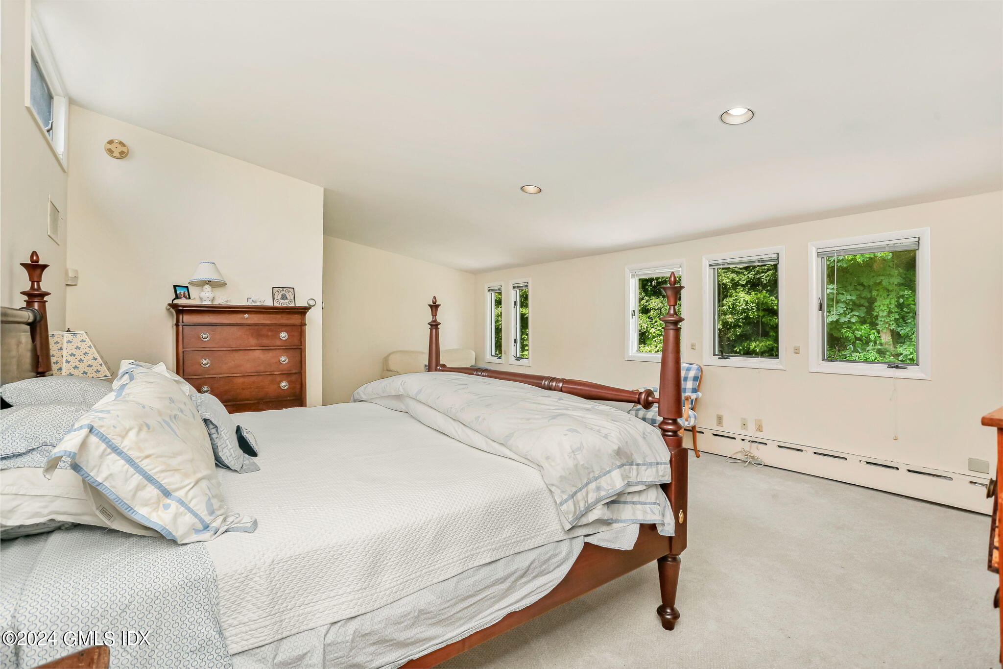 58 Arch Street Riverside, CT 06878 - Photo 11 of 21 a bedroom with a bed and a window