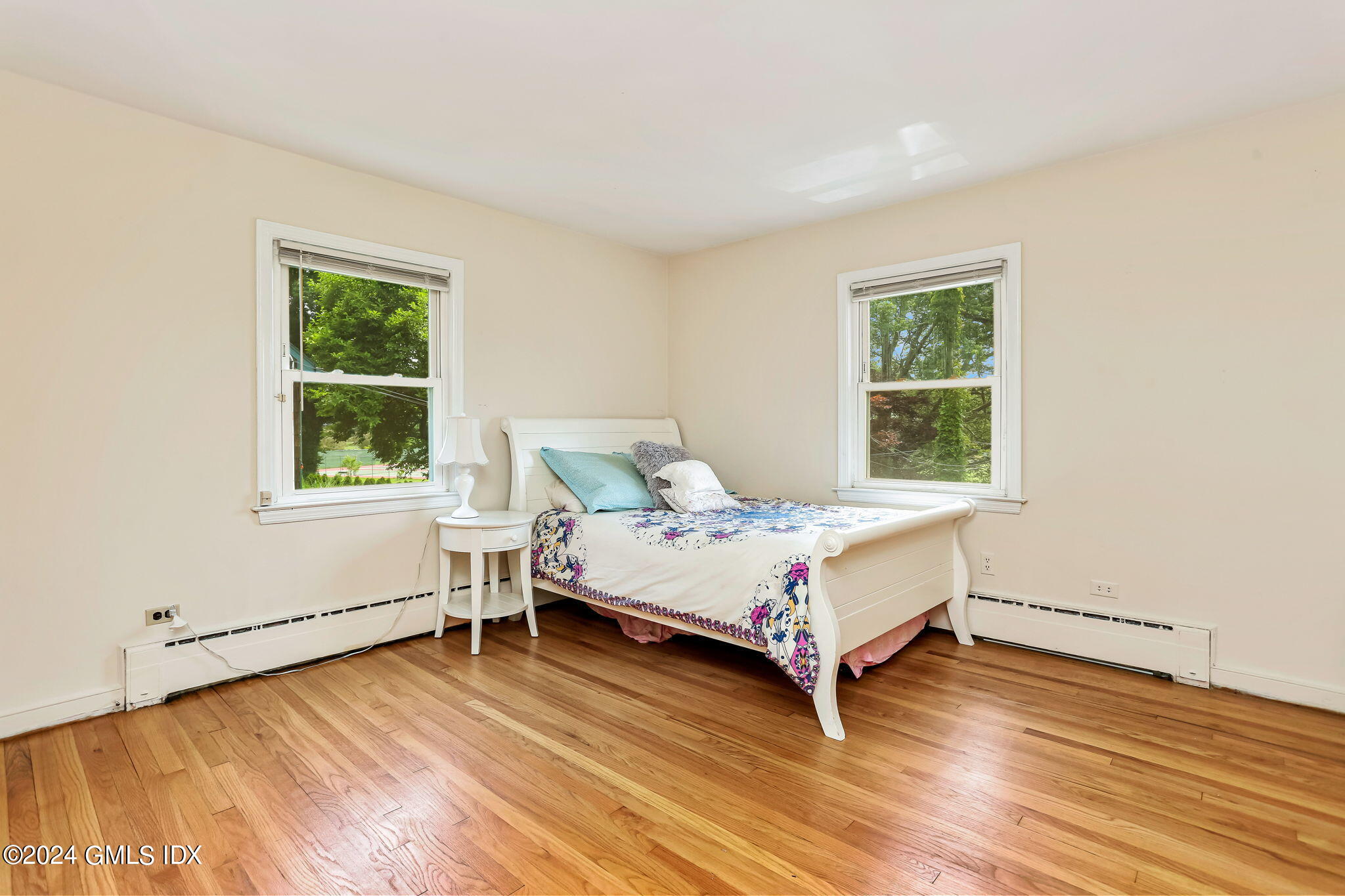 58 Arch Street Riverside, CT 06878 - Photo 14 of 21 a room with a bed and a window