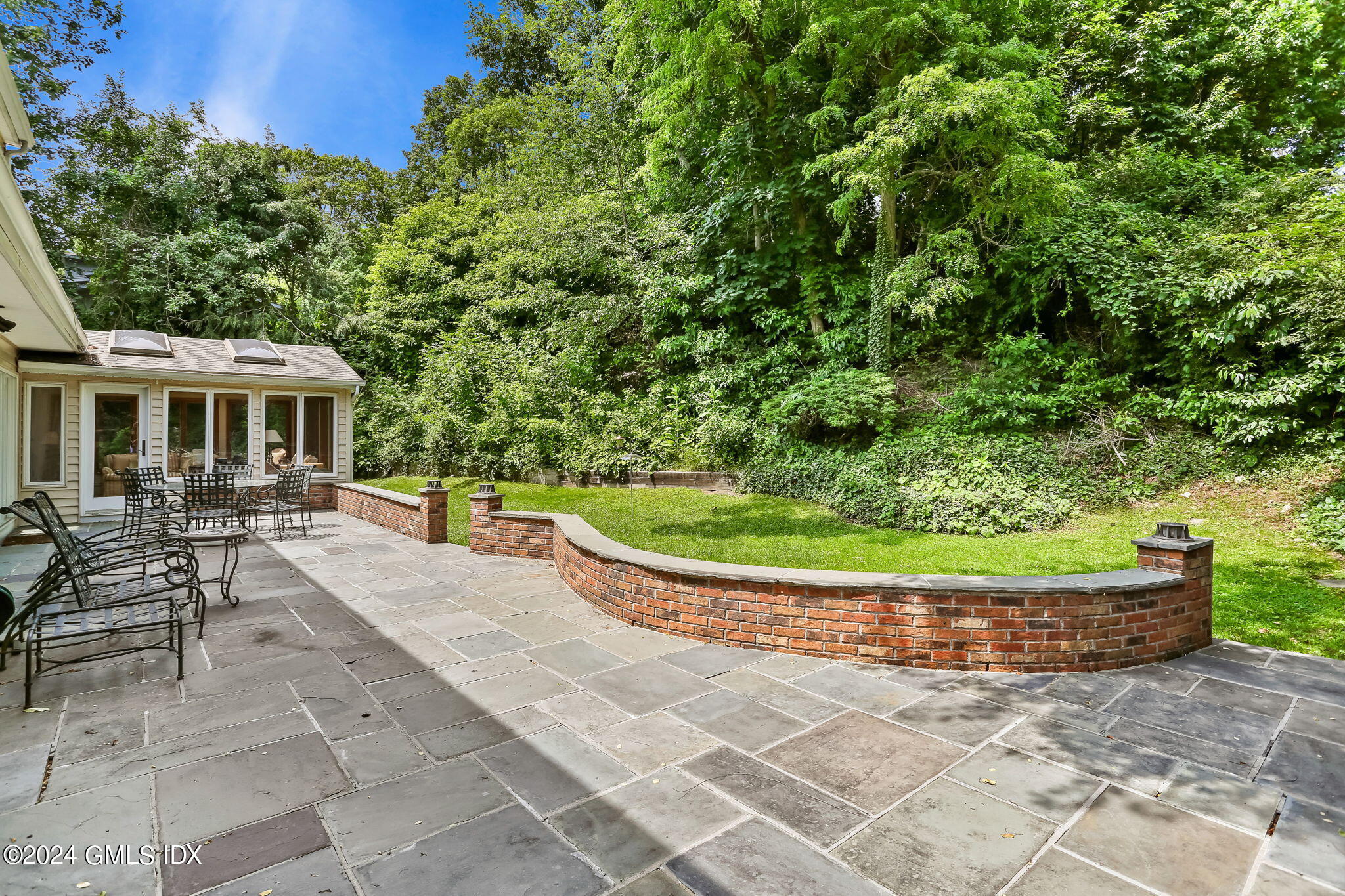 58 Arch Street Riverside, CT 06878 - Photo 17 of 21 a view of a house with swimming pool and sitting area