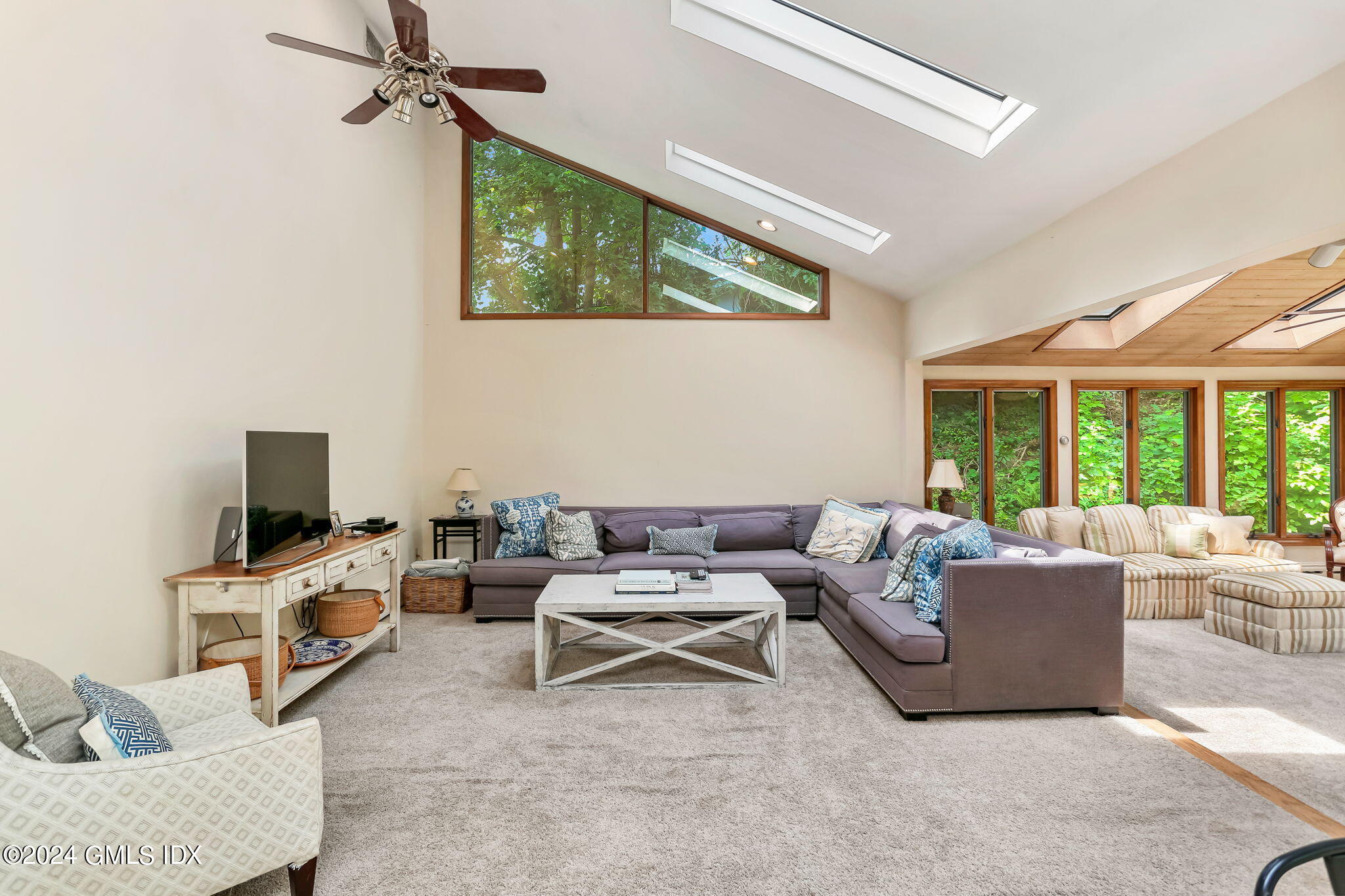58 Arch Street Riverside, CT 06878 - Photo 8 of 21 a living room with furniture and a flat screen tv