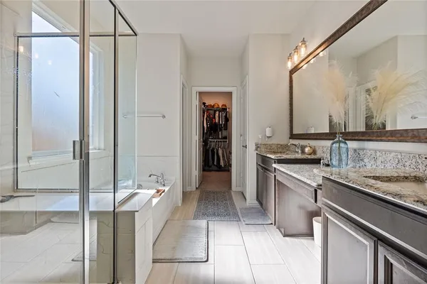 a kitchen with a refrigerator and a sink