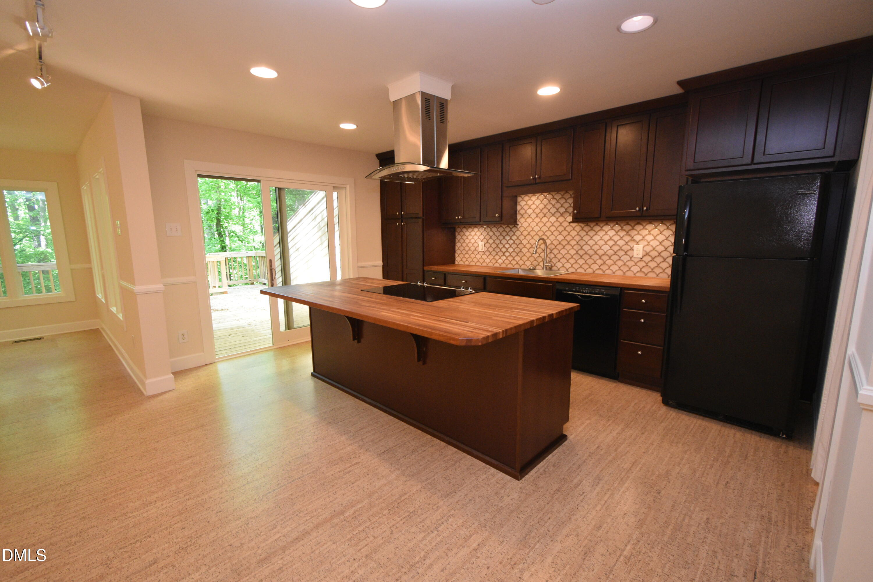 72 Stoneridge Road Durham, NC 27705 - Photo 9 of 28 a kitchen with stainless steel appliances granite countertop a refrigerator a sink dishwasher a stove and a refrigerator with wooden floor