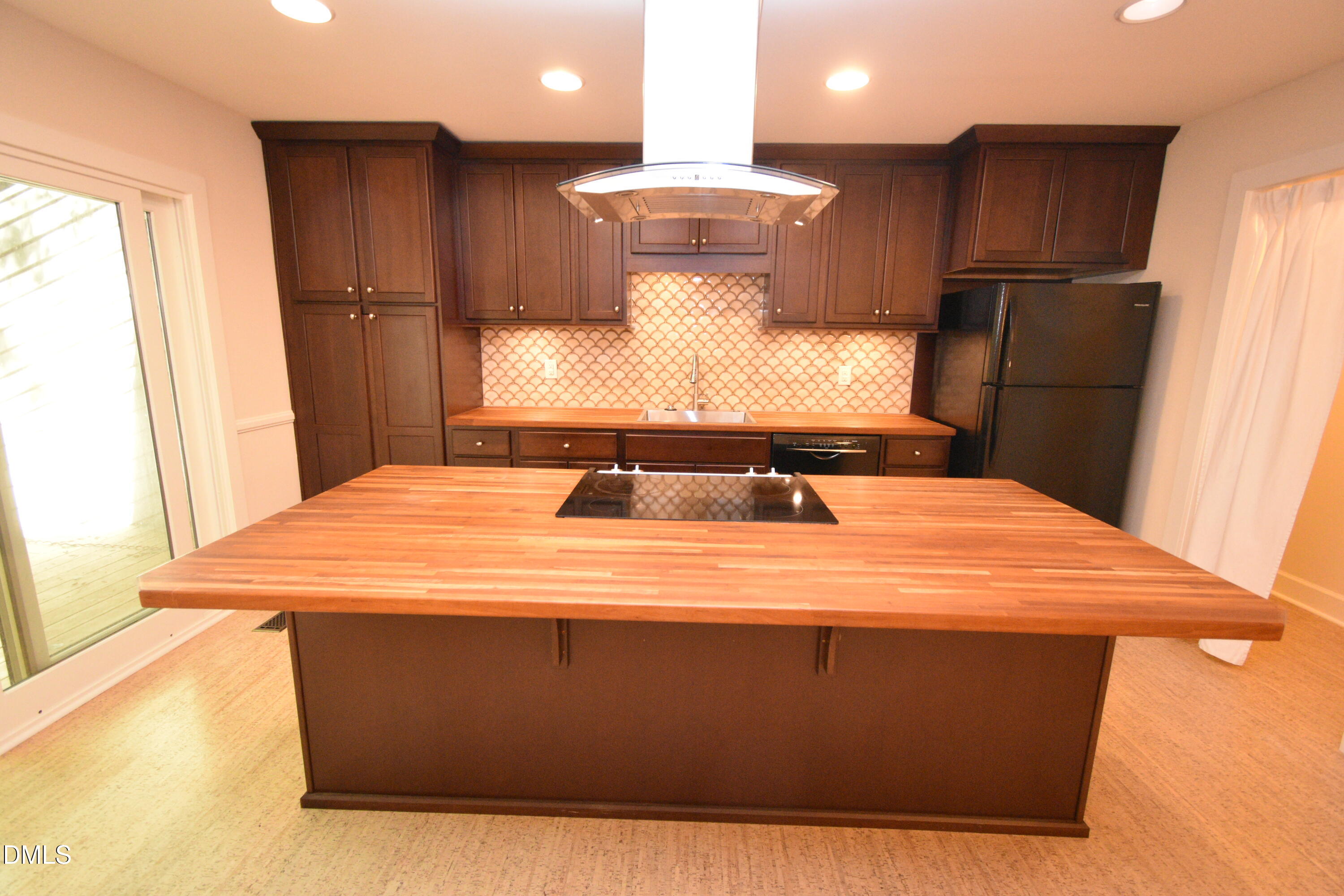 72 Stoneridge Road Durham, NC 27705 - Photo 10 of 28 a large white kitchen with a sink