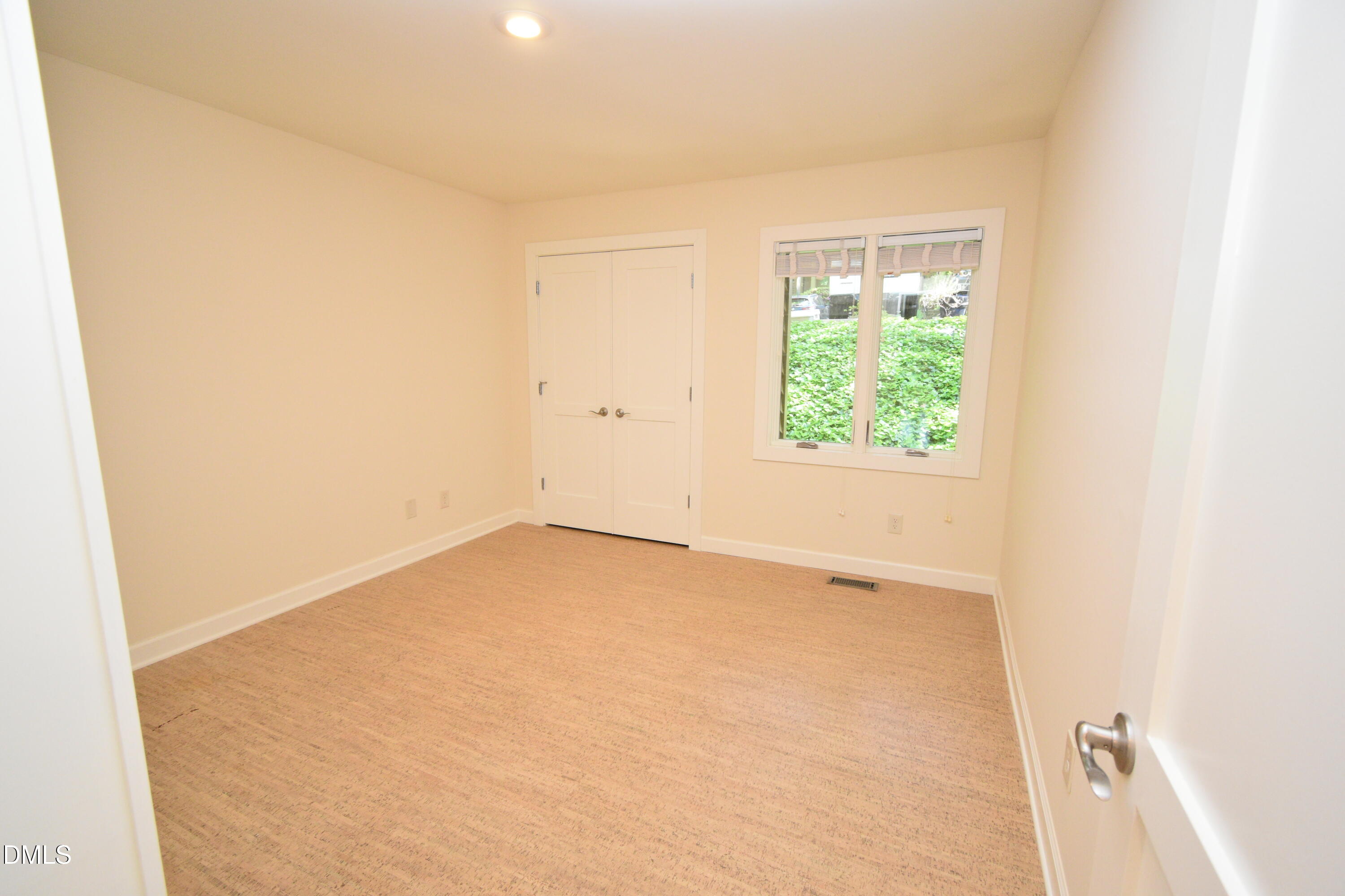 72 Stoneridge Road Durham, NC 27705 - Photo 16 of 28 an empty room with a window