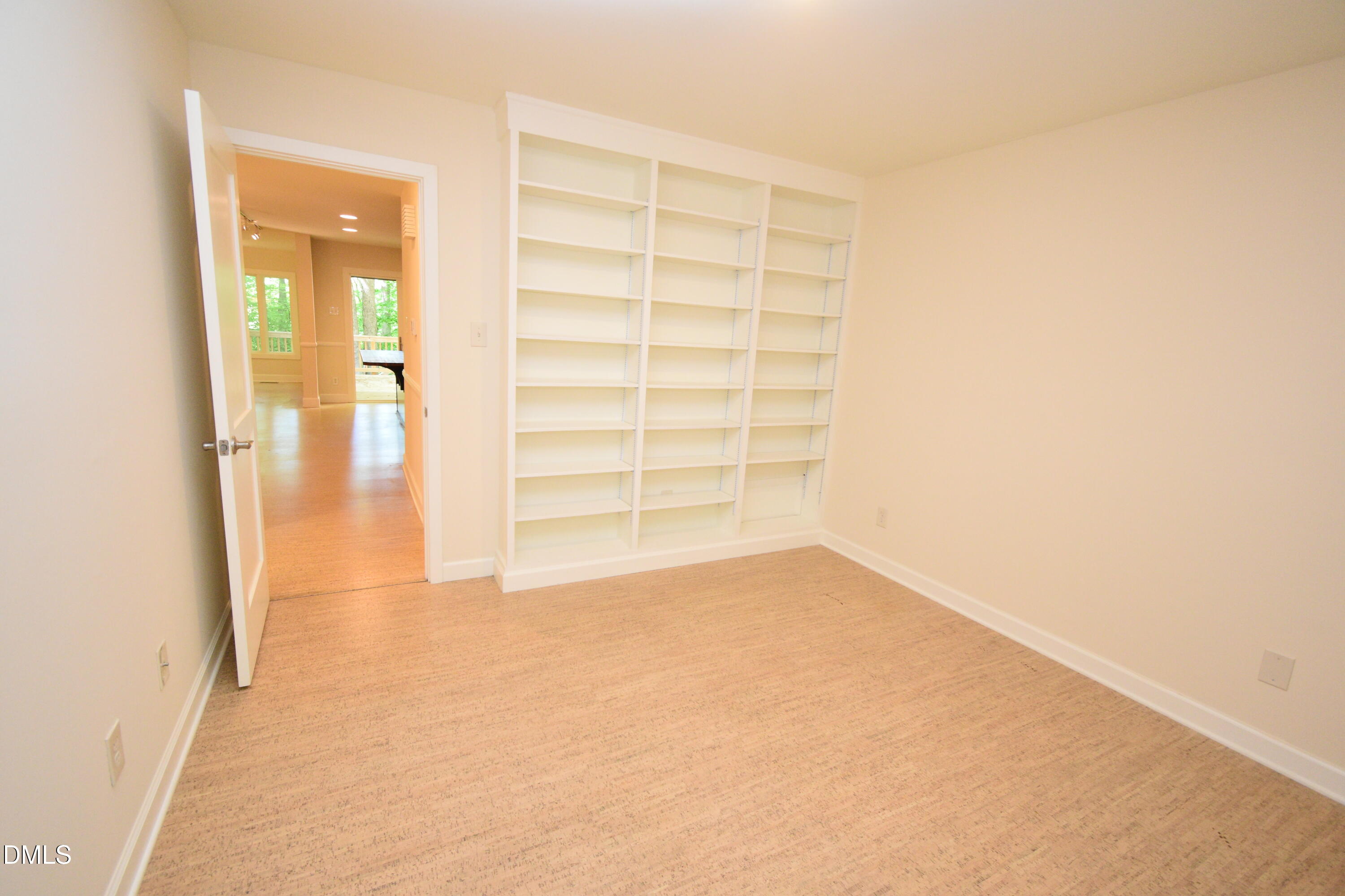 72 Stoneridge Road Durham, NC 27705 - Photo 17 of 28 an empty room with windows and closet