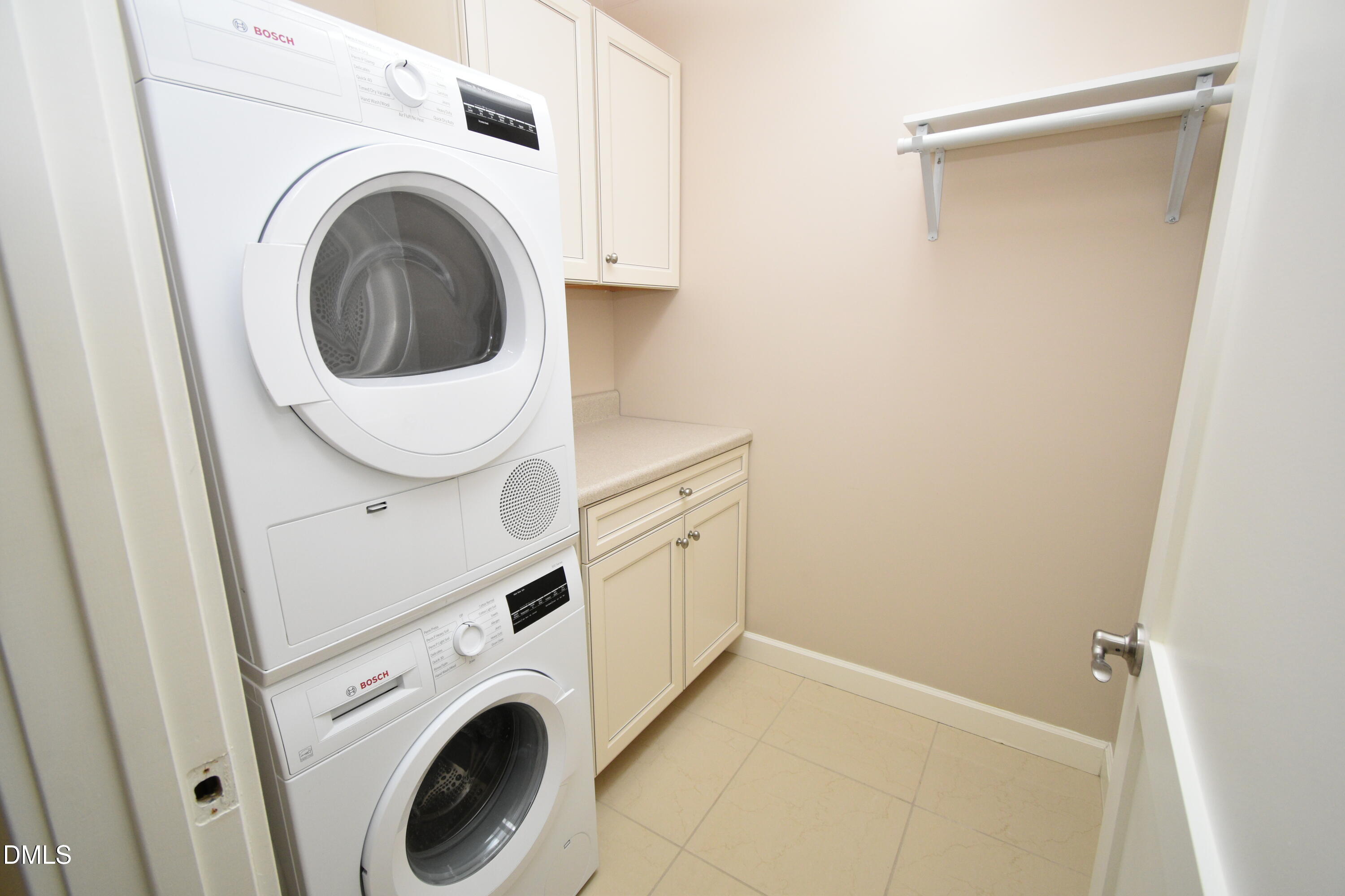72 Stoneridge Road Durham, NC 27705 - Photo 18 of 28 a utility room with dryer and washer