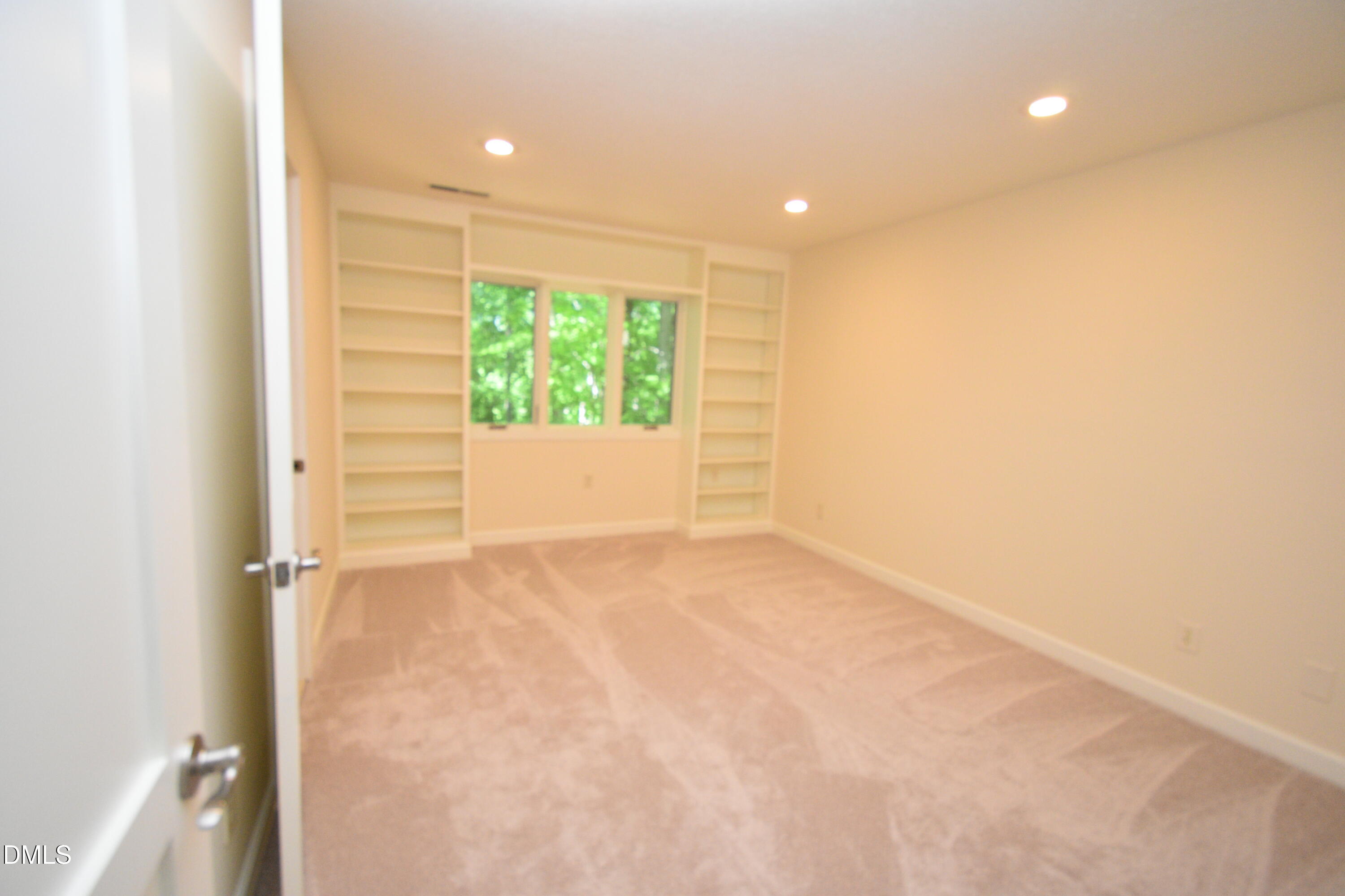 72 Stoneridge Road Durham, NC 27705 - Photo 19 of 28 an empty room with windows
