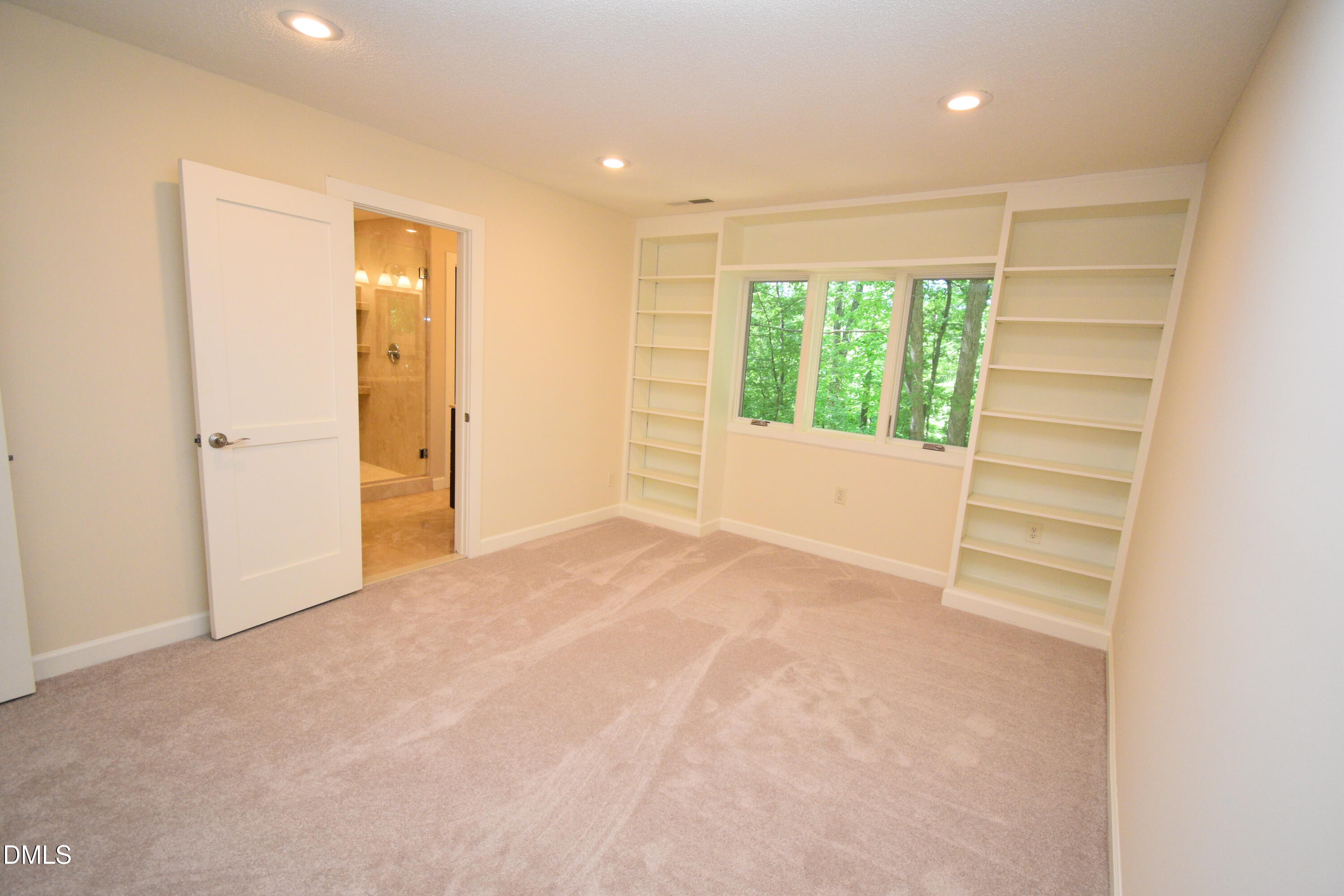72 Stoneridge Road Durham, NC 27705 - Photo 20 of 28 a view of an empty room with a window