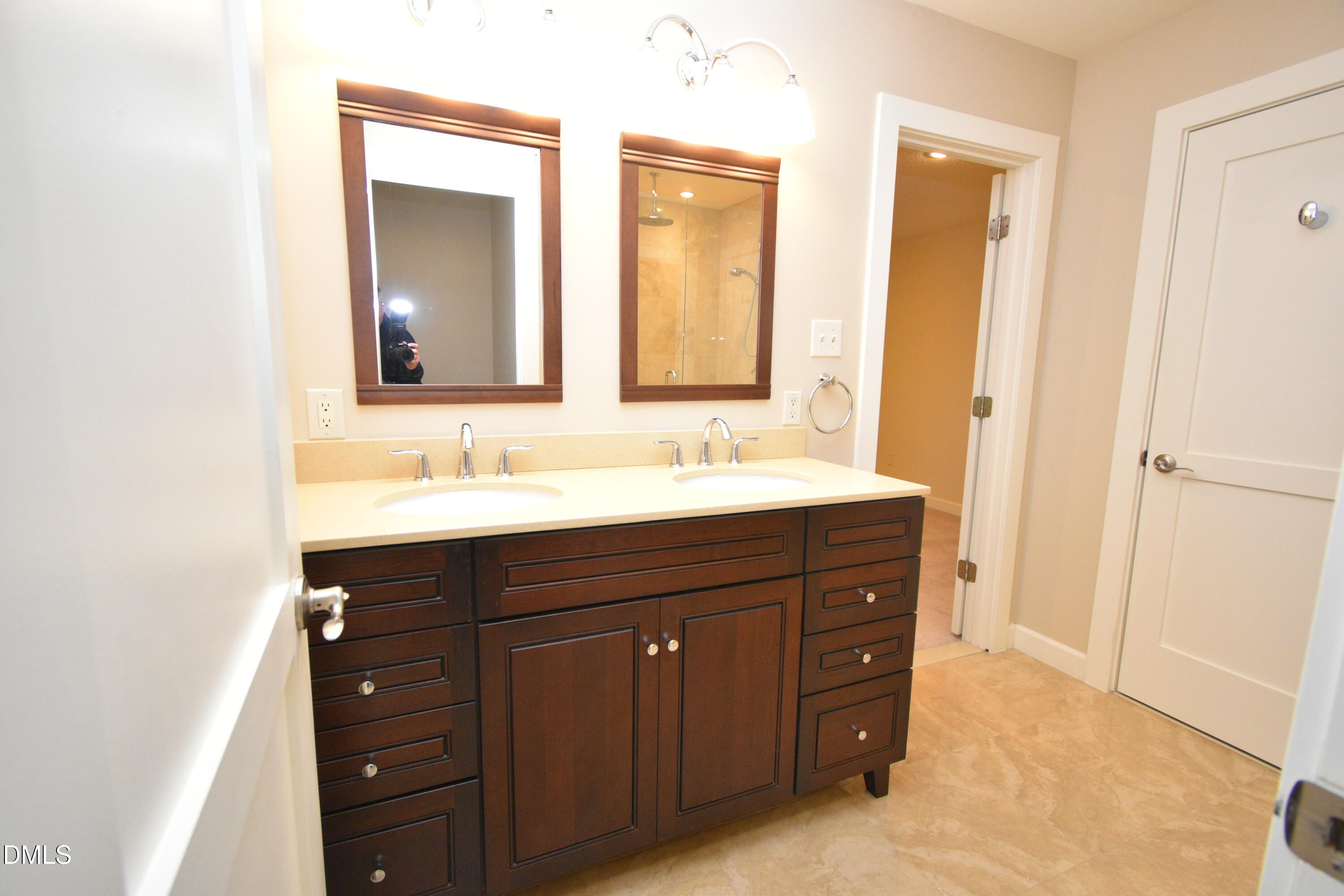 72 Stoneridge Road Durham, NC 27705 - Photo 22 of 28 a bathroom with a sink vanity and a mirror