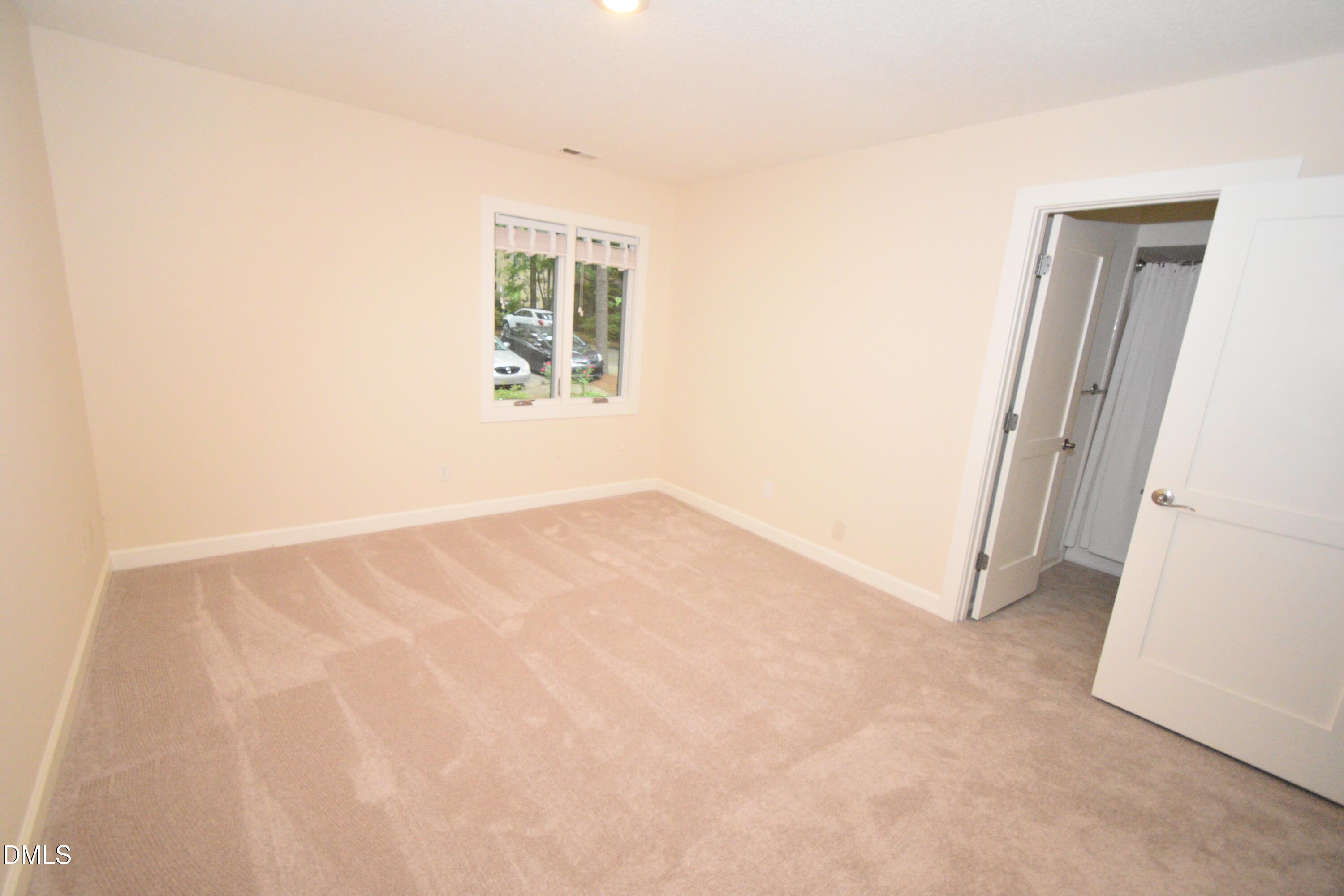 72 Stoneridge Road Durham, NC 27705 - Photo 26 of 28 an empty room with windows