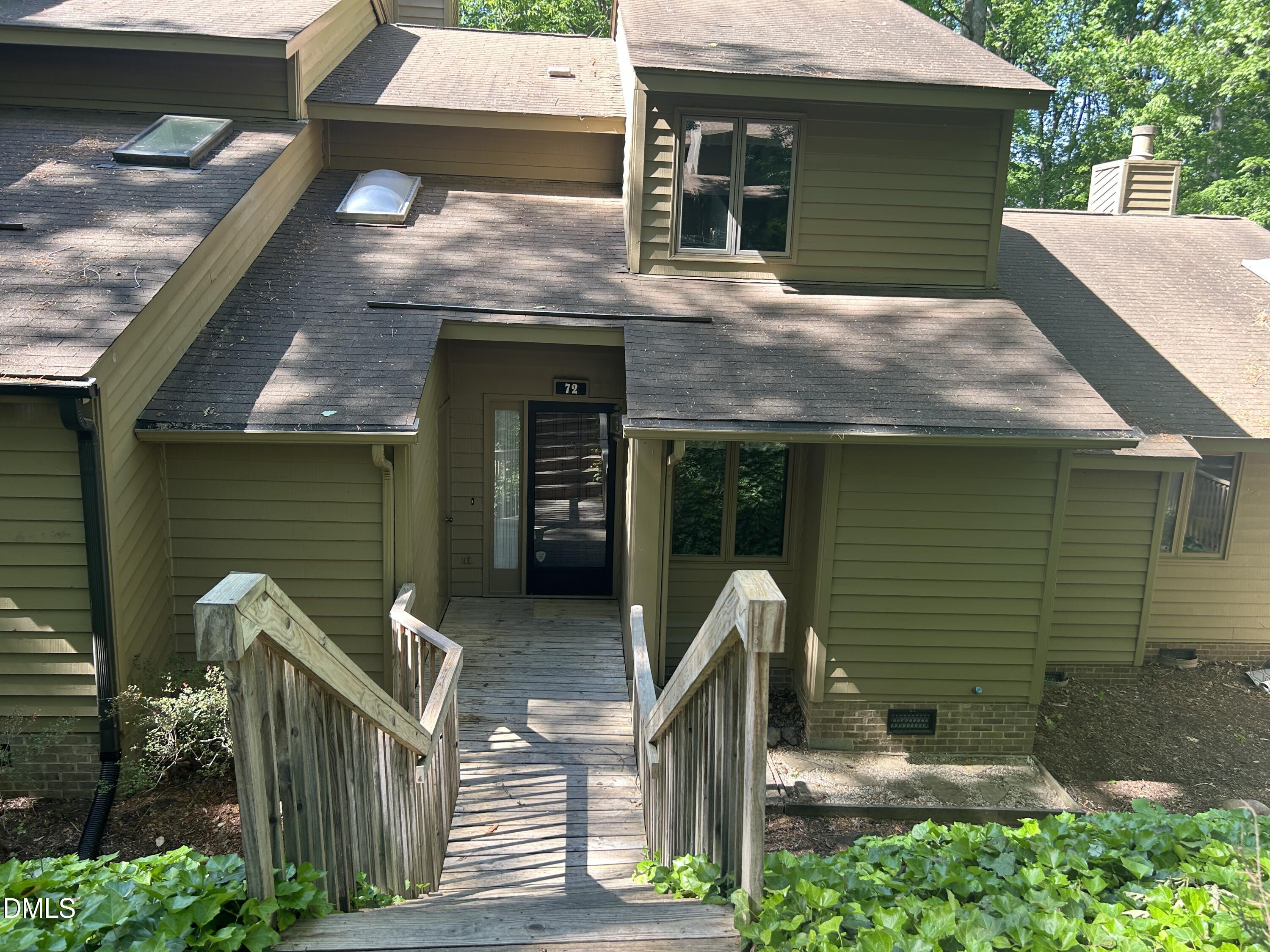 72 Stoneridge Road Durham, NC 27705 - Photo 2 of 28 a front view of a house with plants