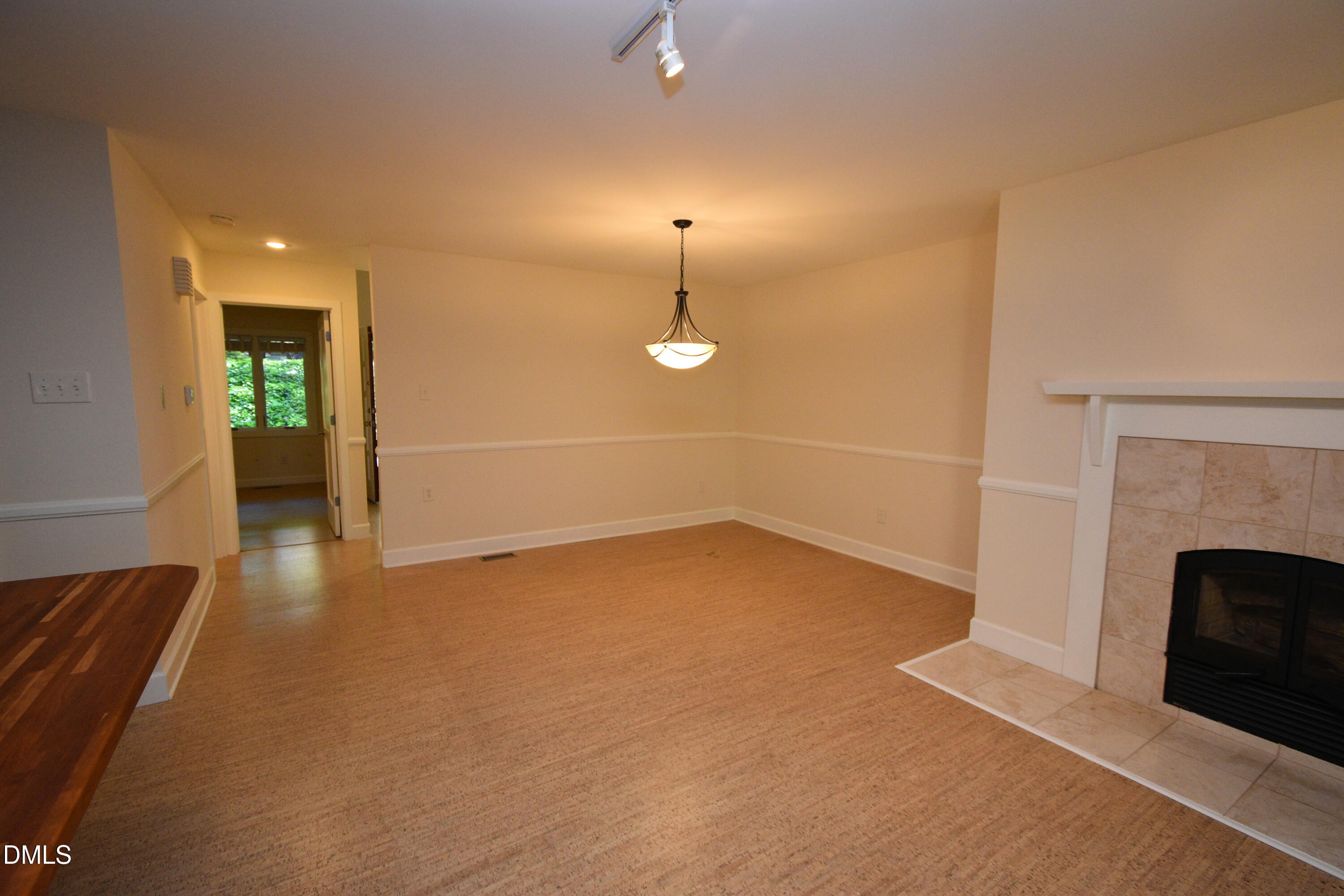 72 Stoneridge Road Durham, NC 27705 - Photo 6 of 28 a view of empty room with wooden floor