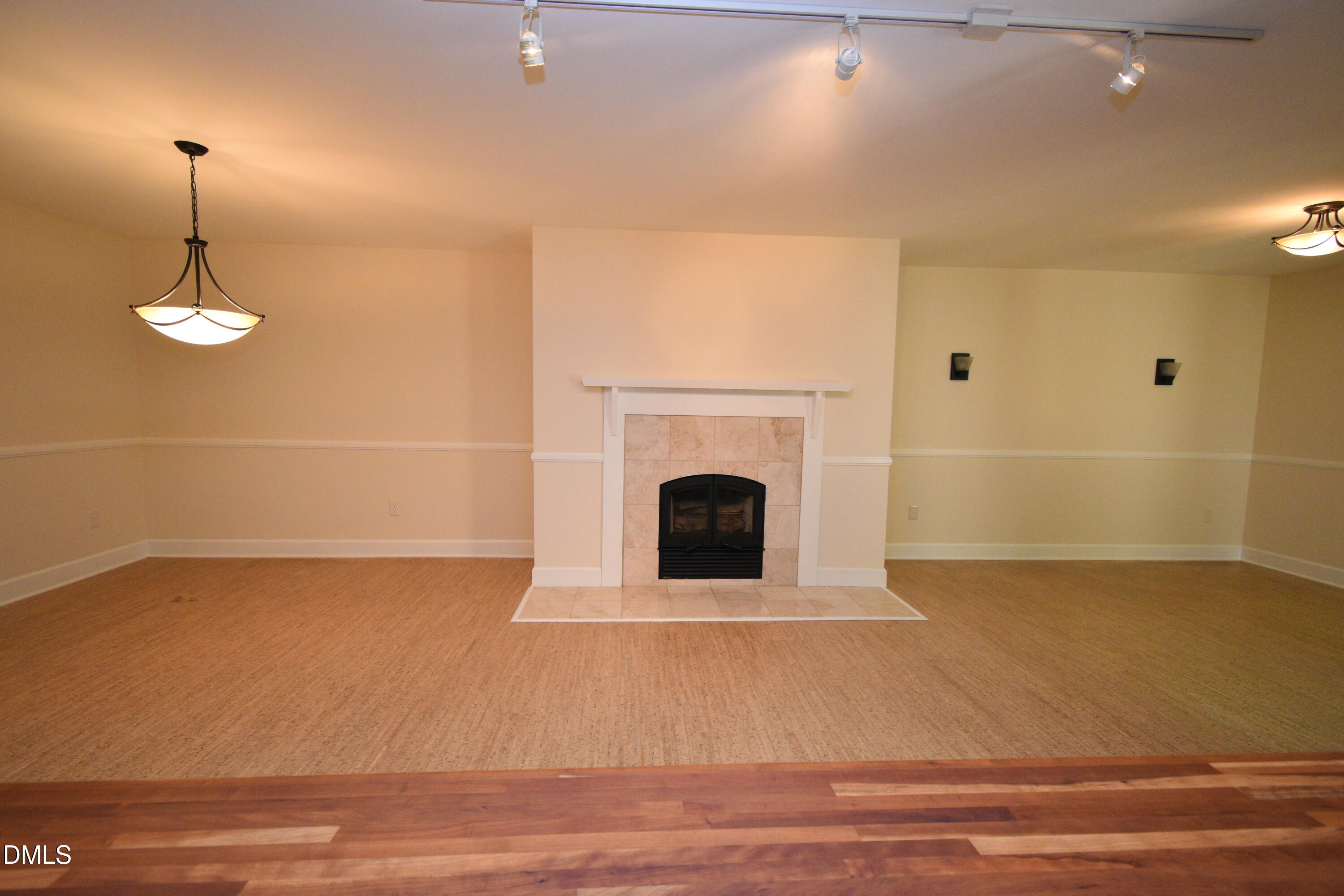 72 Stoneridge Road Durham, NC 27705 - Photo 8 of 28 a view of a livingroom with a fireplace and window