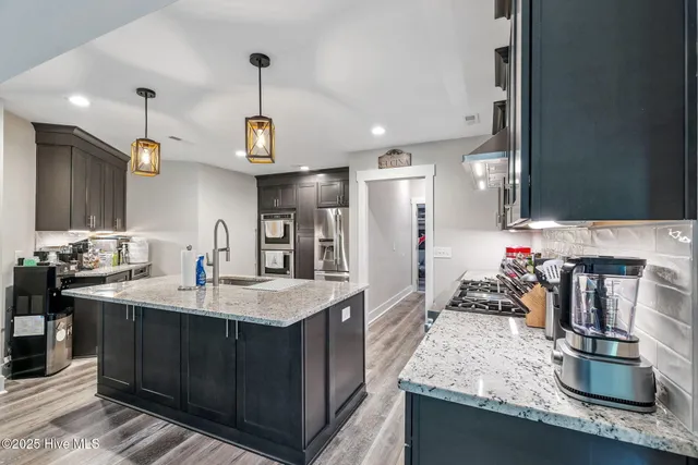 $950,000 | 7054 Healy Haven Lane Northeast, Leland, NC 28451