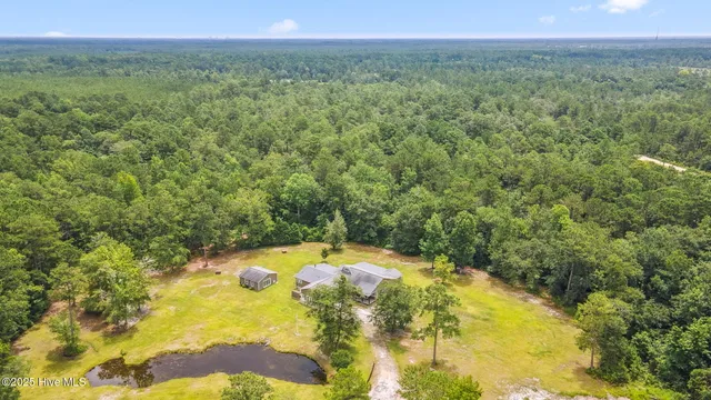 $950,000 | 7054 Healy Haven Lane Northeast, Leland, NC 28451