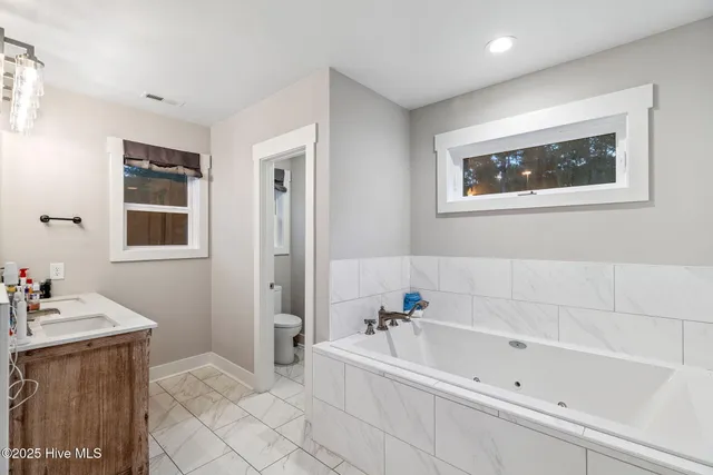 $950,000 | 7054 Healy Haven Lane Northeast, Leland, NC 28451