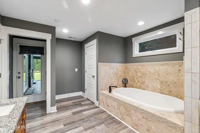 $950,000 | 7054 Healy Haven Lane Northeast, Leland, NC 28451