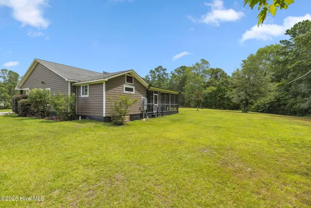 $950,000 | 7054 Healy Haven Lane Northeast, Leland, NC 28451