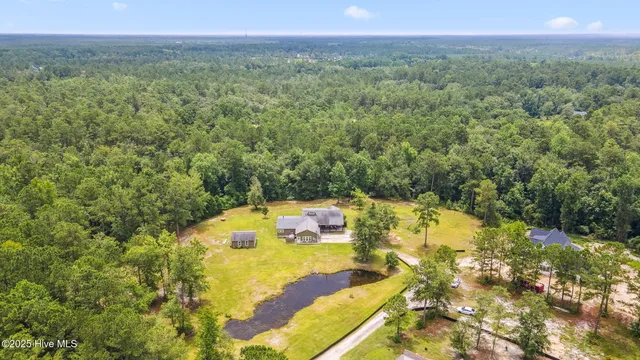 $950,000 | 7054 Healy Haven Lane Northeast, Leland, NC 28451