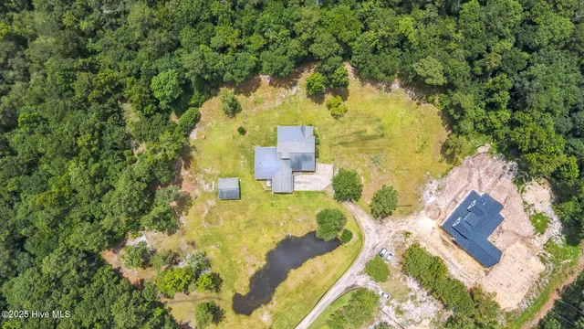 $950,000 | 7054 Healy Haven Lane Northeast, Leland, NC 28451