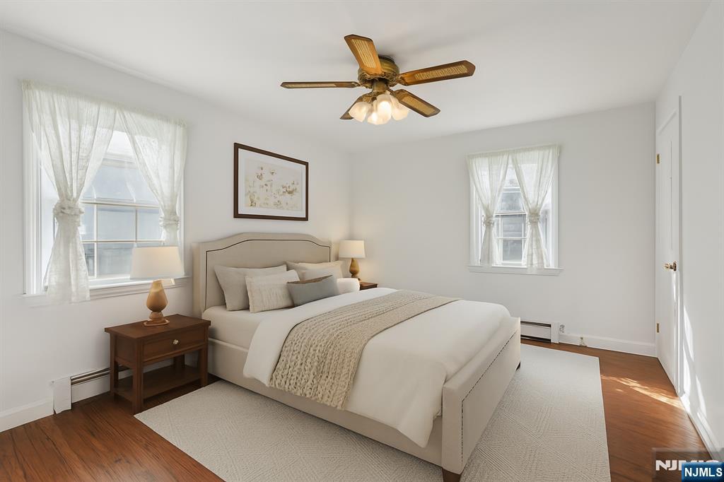 14 Valhalla Way Wayne, NJ 07470 - Photo 14 of 32 a bedroom with a bed and a window