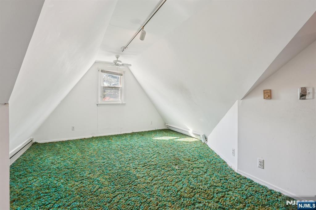 14 Valhalla Way Wayne, NJ 07470 - Photo 19 of 32 a view of a back yard from a hallway