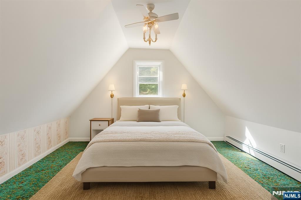 14 Valhalla Way Wayne, NJ 07470 - Photo 20 of 32 a bedroom with a bed and a window