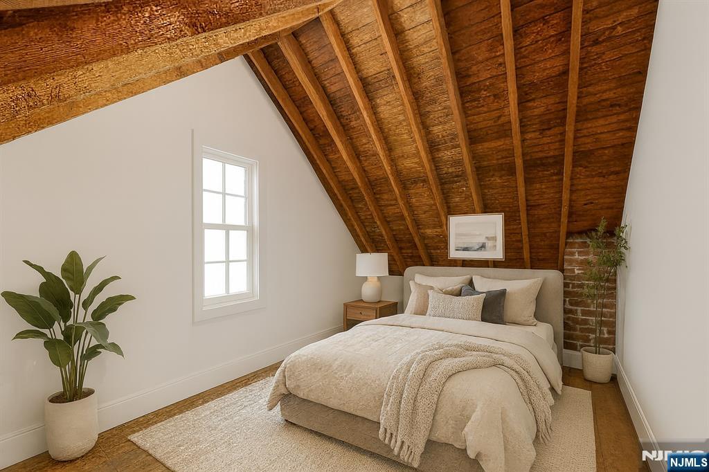 14 Valhalla Way Wayne, NJ 07470 - Photo 22 of 32 a bedroom with a bed and window