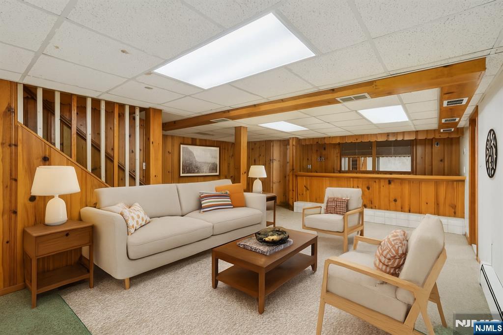 14 Valhalla Way Wayne, NJ 07470 - Photo 25 of 32 a living room with furniture and a large window
