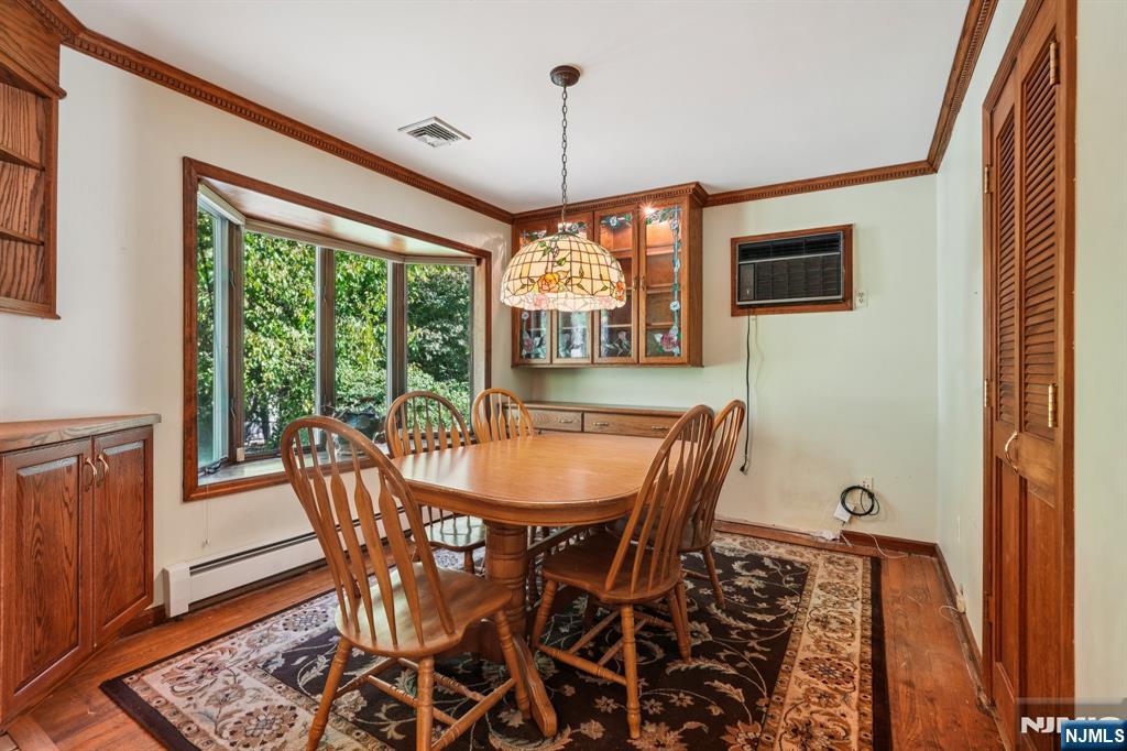 14 Valhalla Way Wayne, NJ 07470 - Photo 6 of 32 a view of a dining room with furniture window and wooden floor
