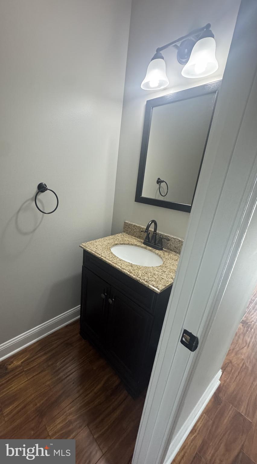 1031 Rafter Road Norristown, PA 19403 - Photo 8 of 17 a bathroom with a sink and a mirror