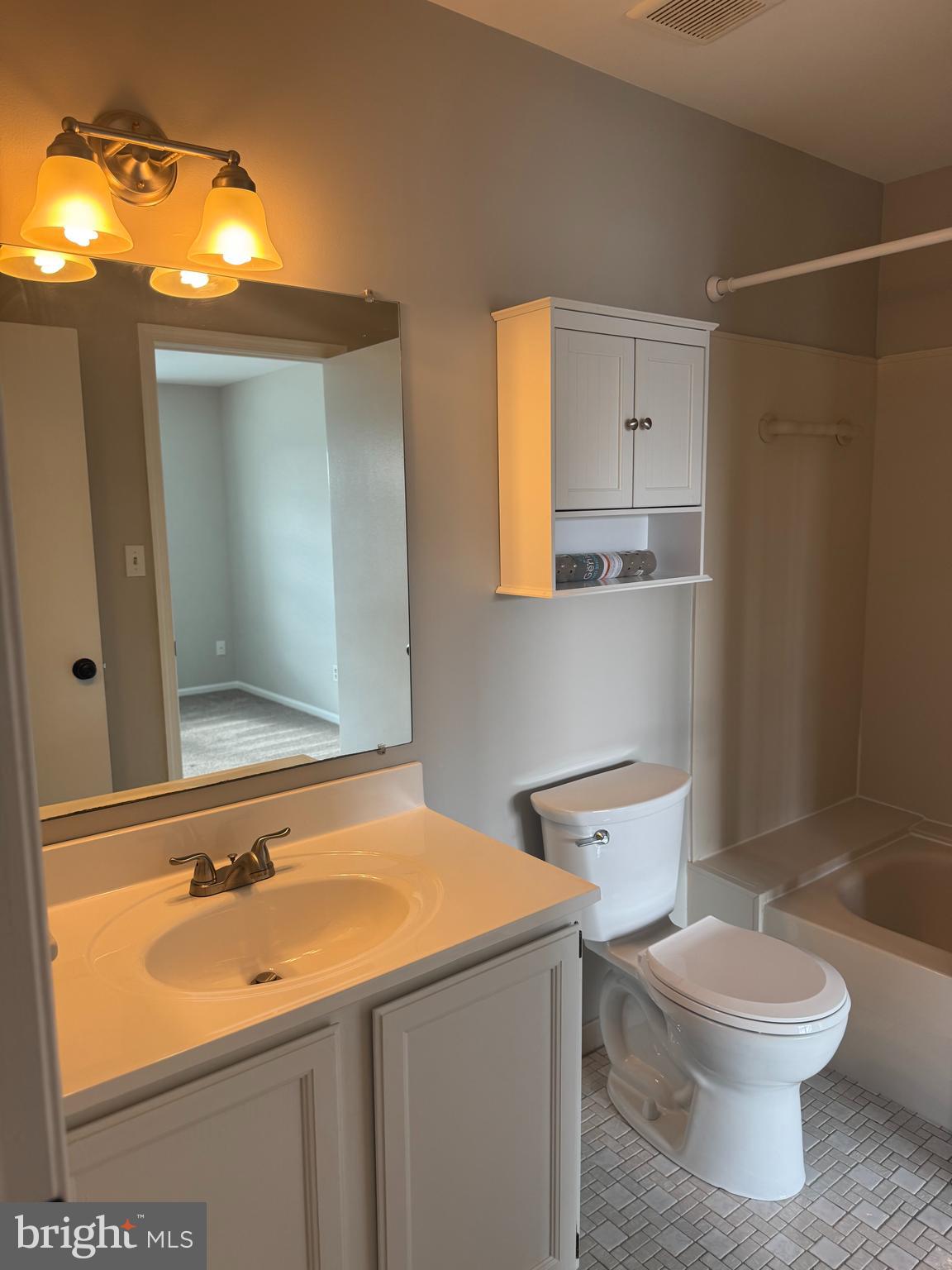 1031 Rafter Road Norristown, PA 19403 - Photo 10 of 17 a bathroom with a sink a toilet and shower