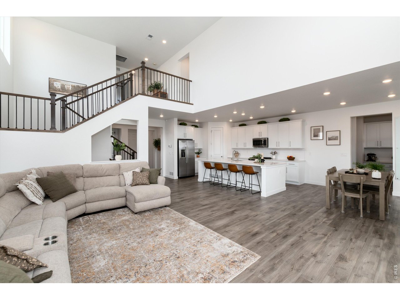 1991 Miranda Road Erie, CO 80516 - Photo 11 of 45 Grand Living Room with Soaring Ceilings, Mountain Views, and Abundant Light