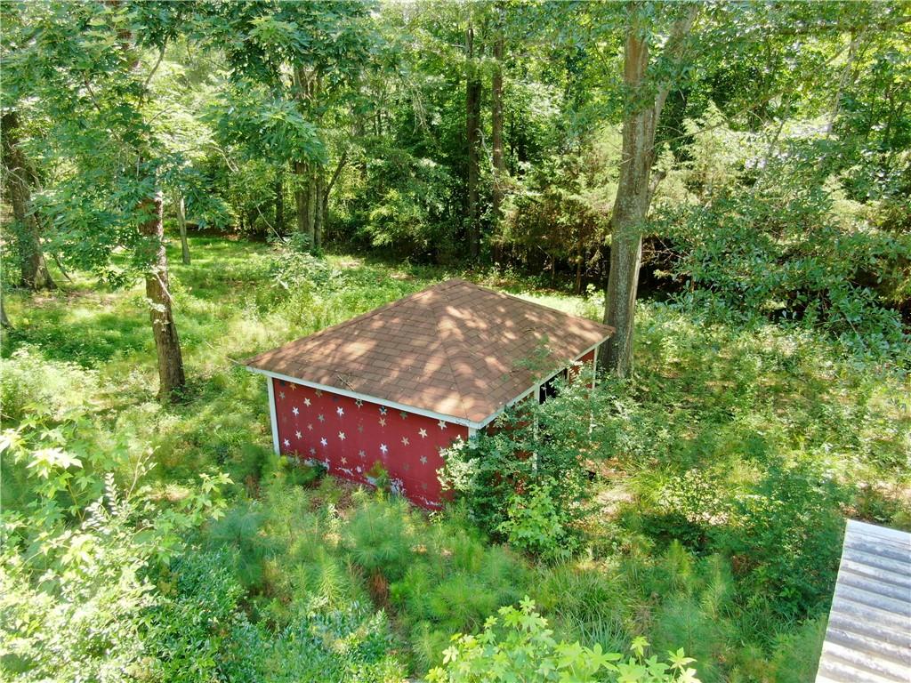8916 Highway 166 Winston, GA 30187 - Photo 15 of 52 a view of a lush green forest