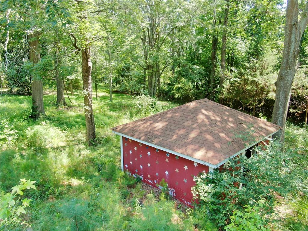 8916 Highway 166 Winston, GA 30187 - Photo 16 of 52 a view of a backyard