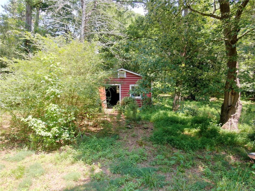 8916 Highway 166 Winston, GA 30187 - Photo 18 of 52 a view of a house with a tree