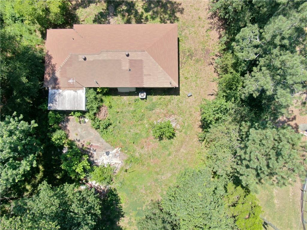8916 Highway 166 Winston, GA 30187 - Photo 21 of 52 an aerial view of a house with a yard
