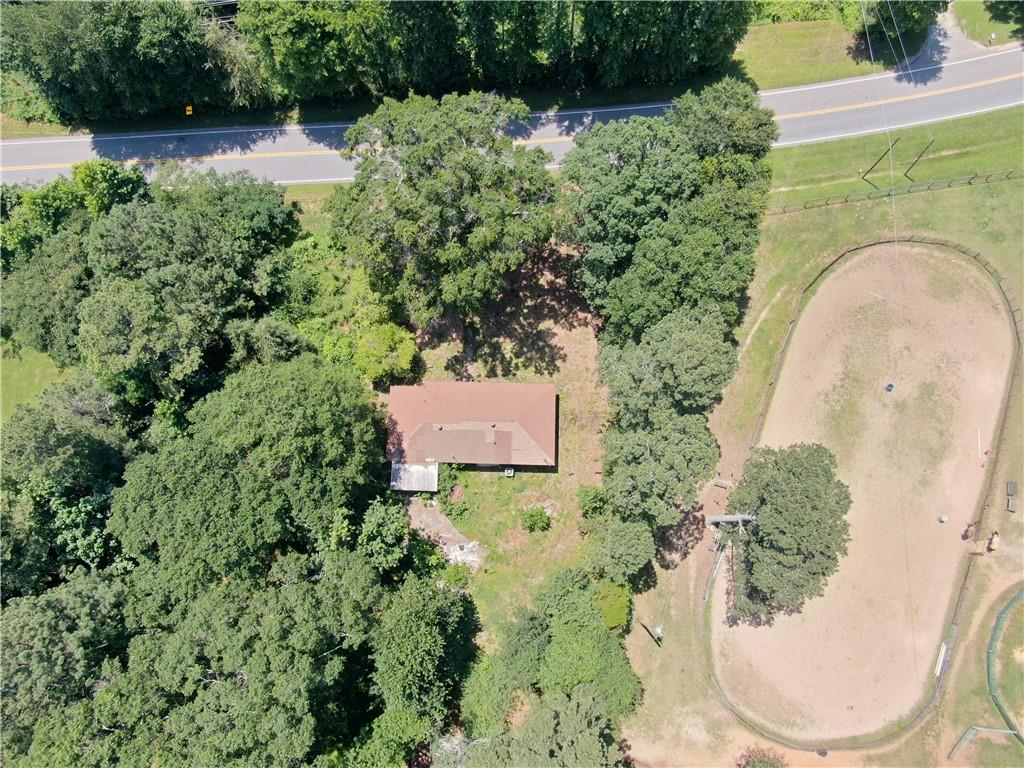 8916 Highway 166 Winston, GA 30187 - Photo 22 of 52 an aerial view of a house with a yard