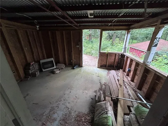 a porch with wooden floor