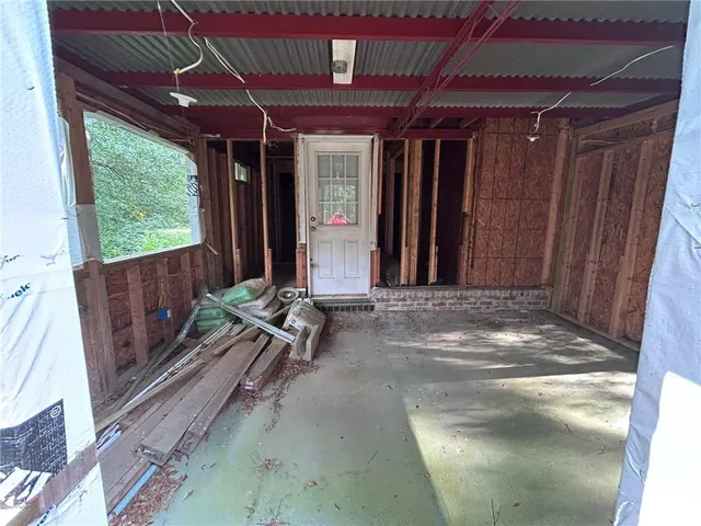 a view of a hallway with a window