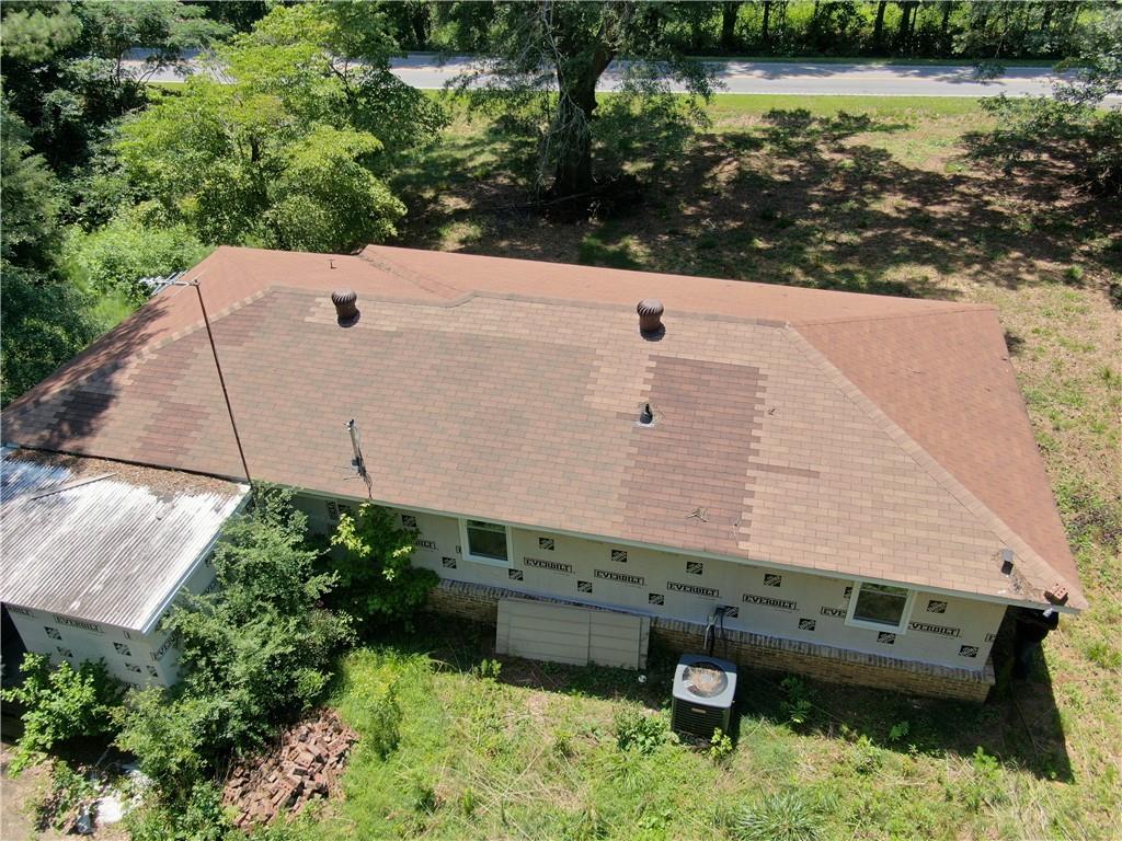 8916 Highway 166 Winston, GA 30187 - Photo 7 of 52 an aerial view of a house with a yard and lake view