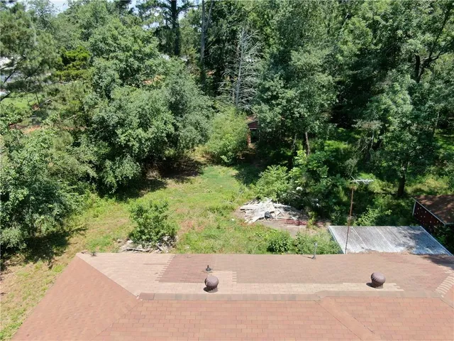a view of a garden with a bench
