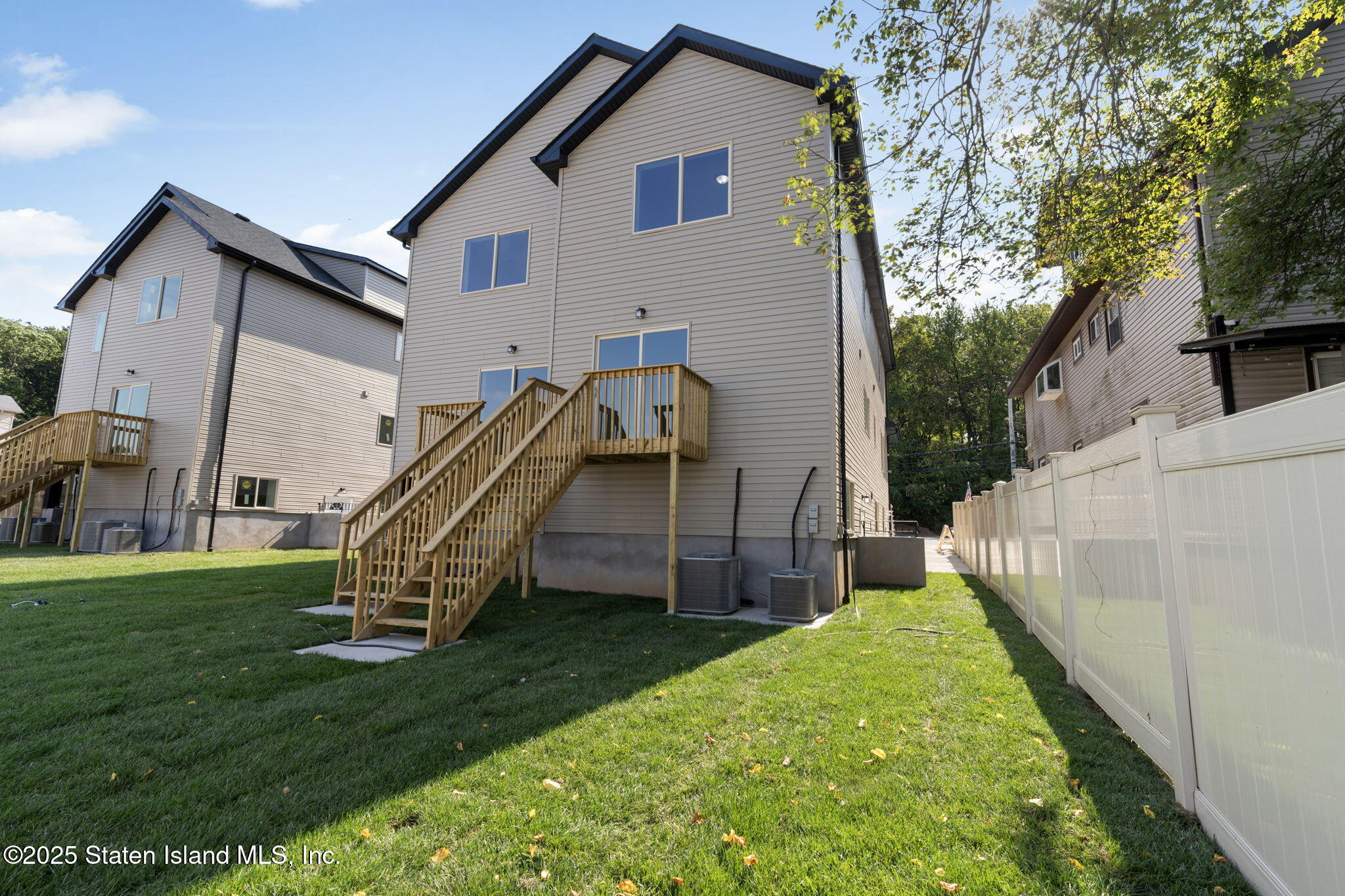 1372 Forest Hill Road, Unit 1A Staten Island, NY 10314 - Photo 21 of 25 a view of a house with backyard