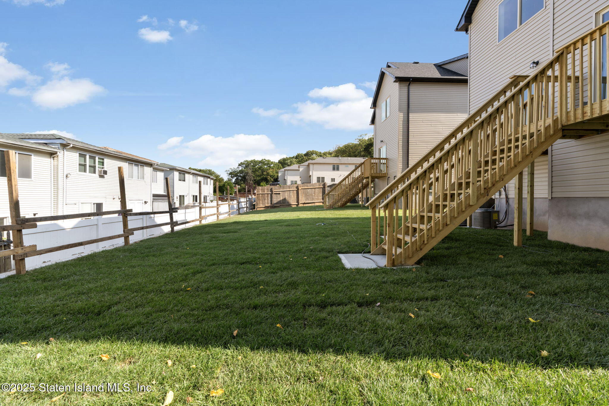 1372 Forest Hill Road, Unit 1A Staten Island, NY 10314 - Photo 22 of 25 a view of a garden with deck