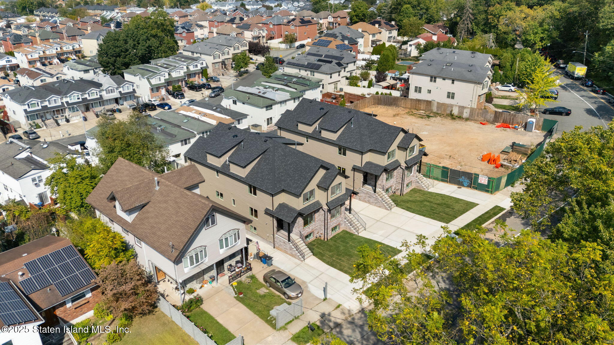 1372 Forest Hill Road, Unit 1A Staten Island, NY 10314 - Photo 24 of 25 an aerial view of a swimming pool and outdoor space