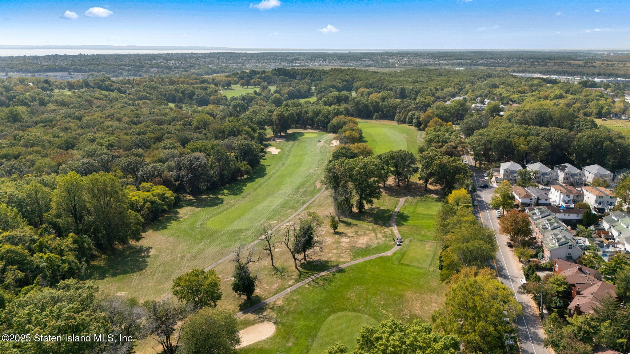1372 Forest Hill Road, Unit 1A Staten Island, NY 10314 - Photo 25 of 25 an aerial view of residential houses with outdoor space