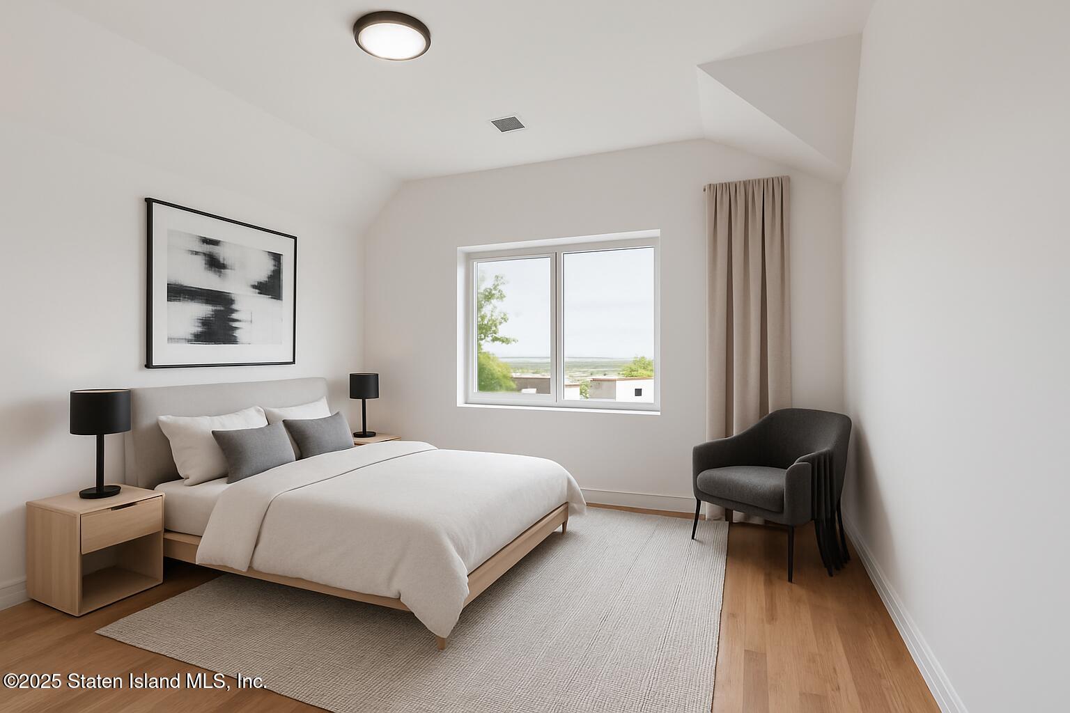 1372 Forest Hill Road, Unit 1A Staten Island, NY 10314 - Photo 7 of 25 a bedroom with a bed and a window