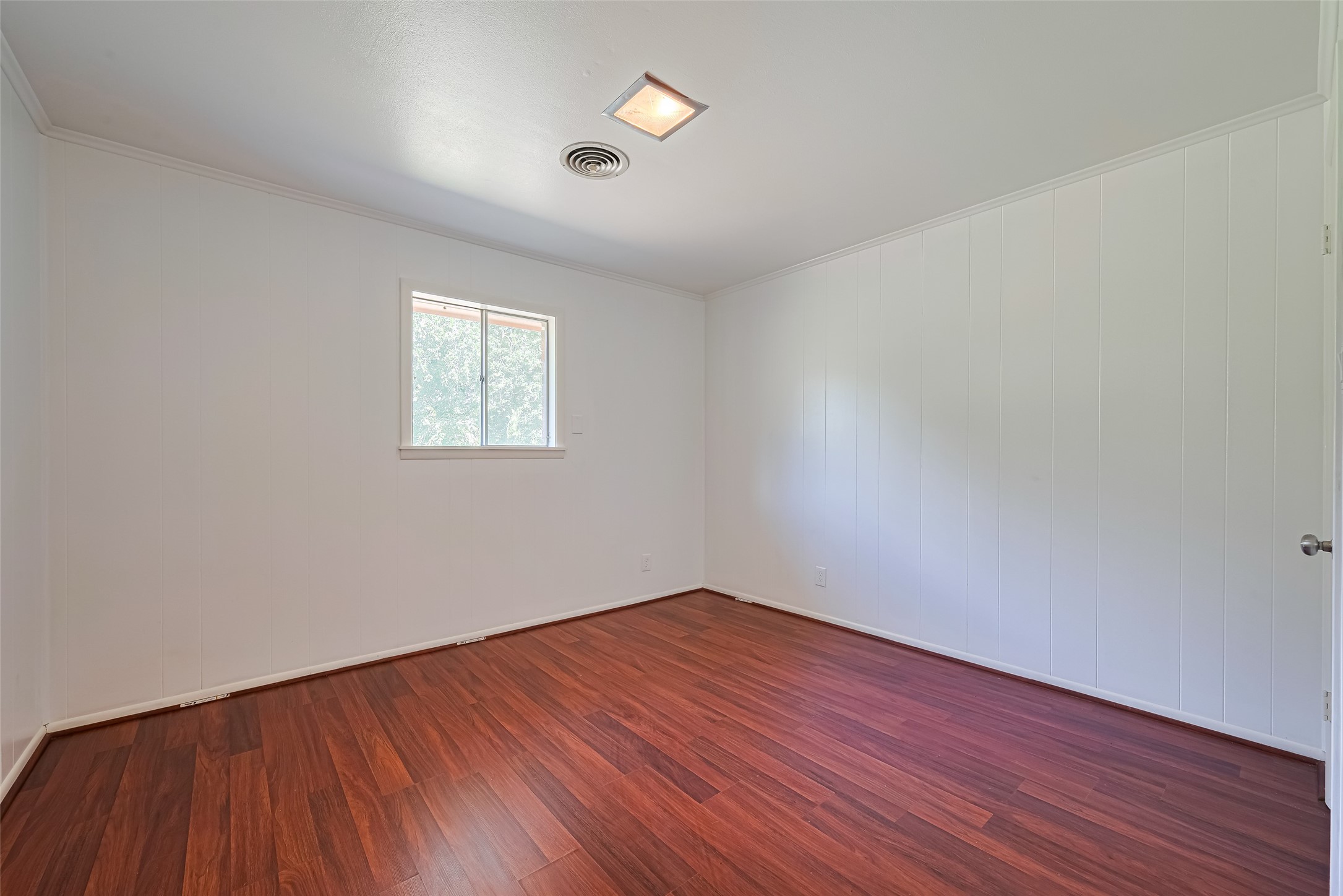 30525 Hegar Road Hockley, TX 77447 - Photo 22 of 49 an empty room with wooden floor and windows