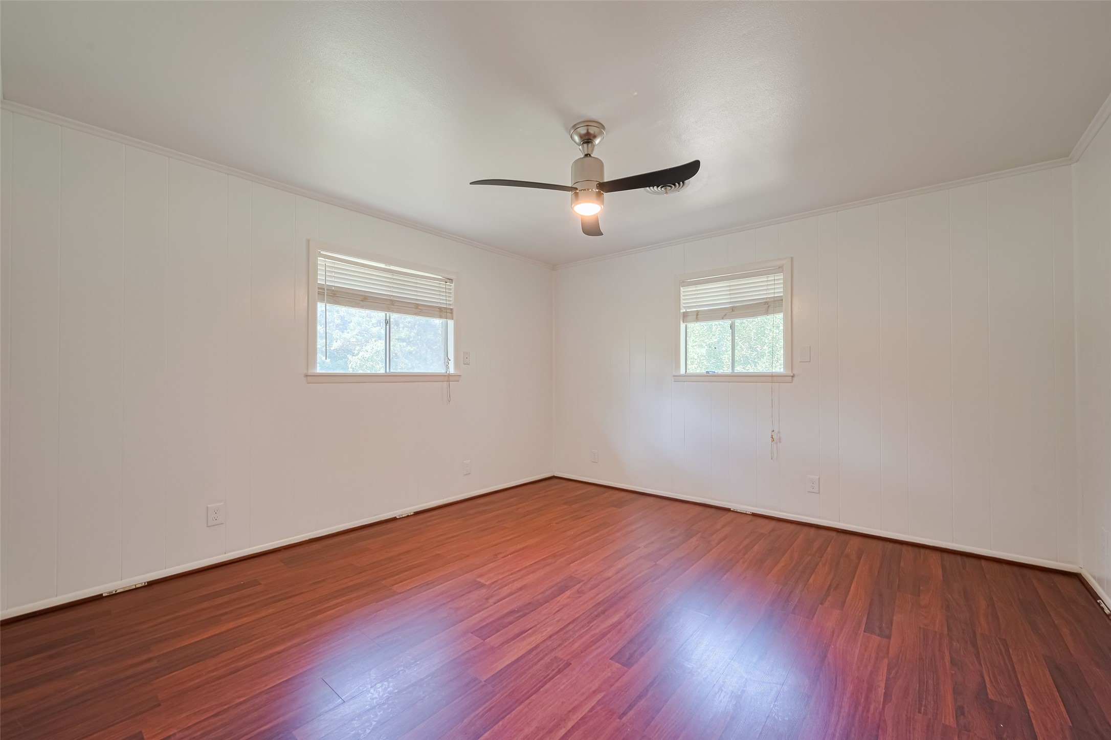 30525 Hegar Road Hockley, TX 77447 - Photo 24 of 49 a view of an empty room with wooden floor and a window